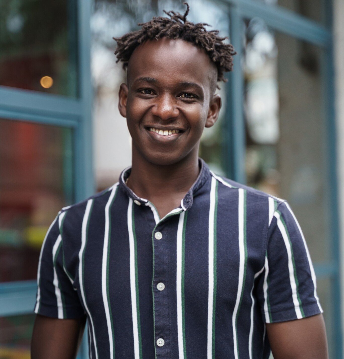 portrait of happy confident african young man with rr5c77z 1.jpg